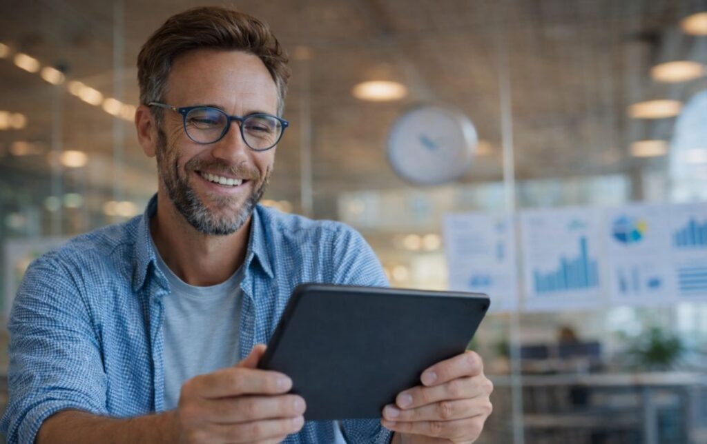 confident business owner celebrating approved fast business funding showing 95% approval rate success